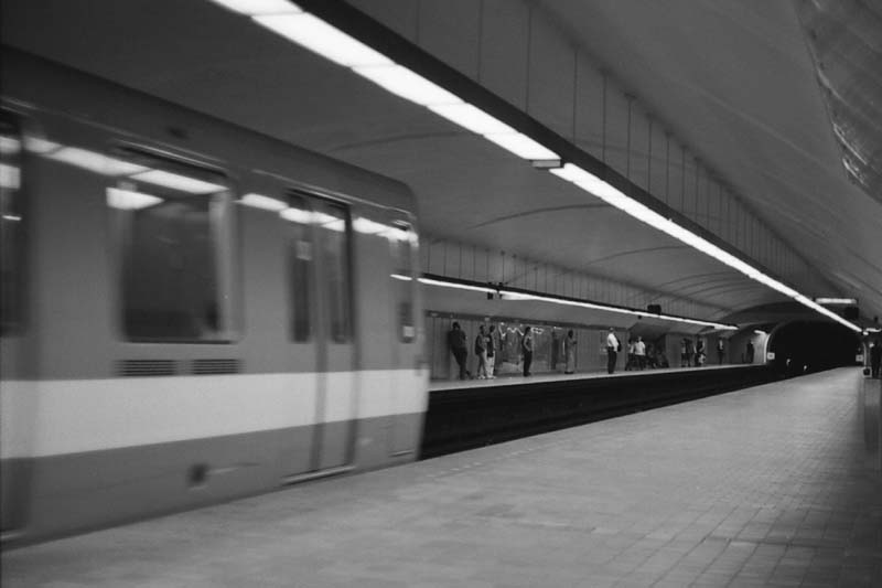 Jarry subway station interior with arriving train