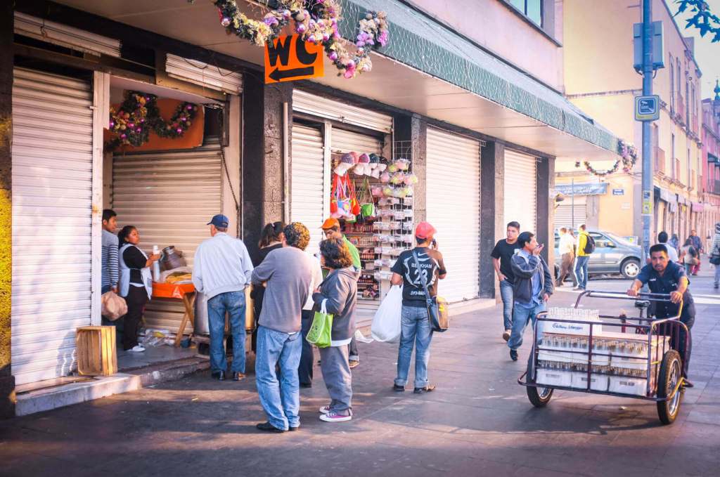 Lining up for atole and tamales in Mexico City