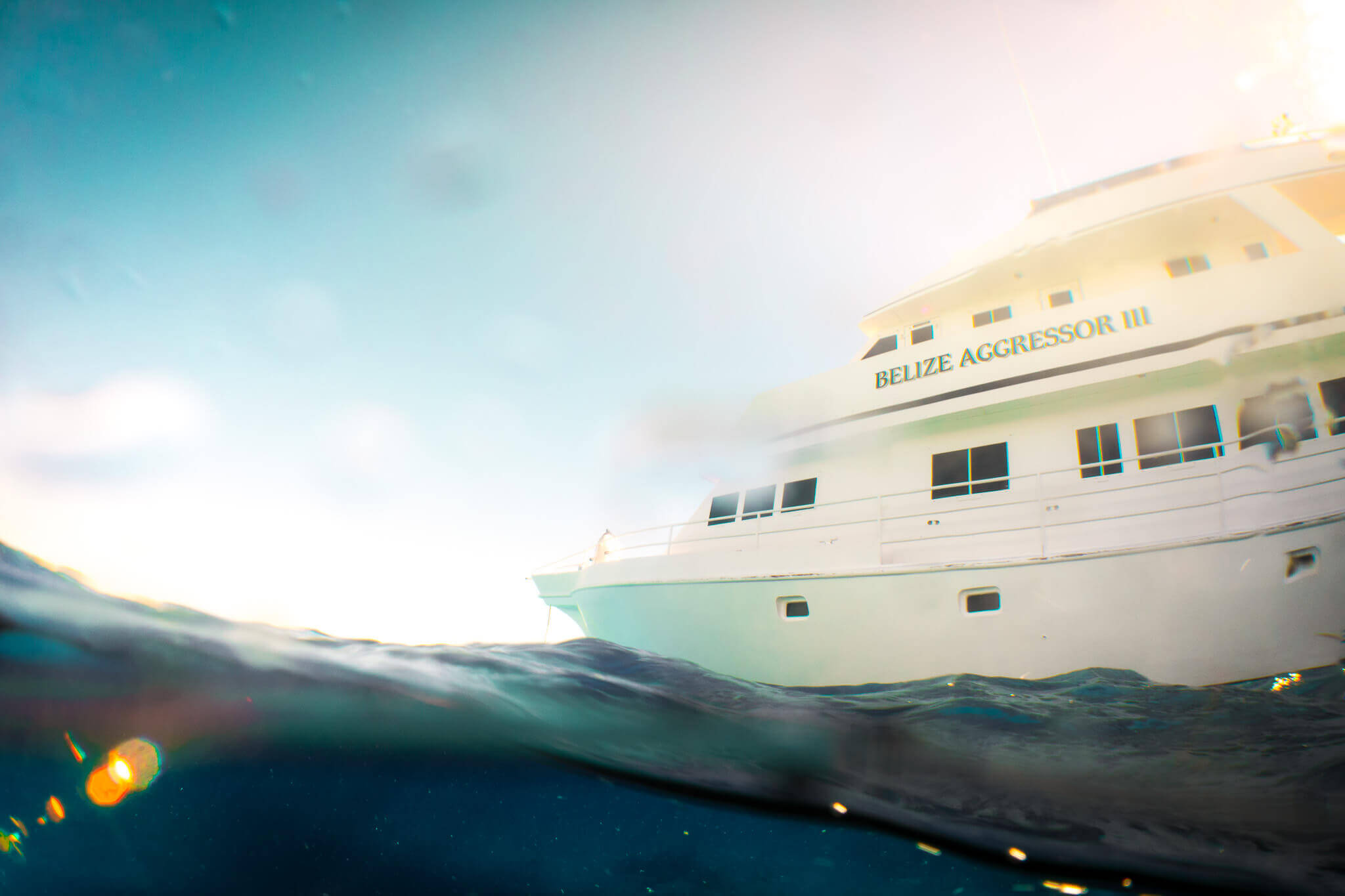 The Belize Aggressor III liveaboard yacht moored at the Great Blue Hole in Belize