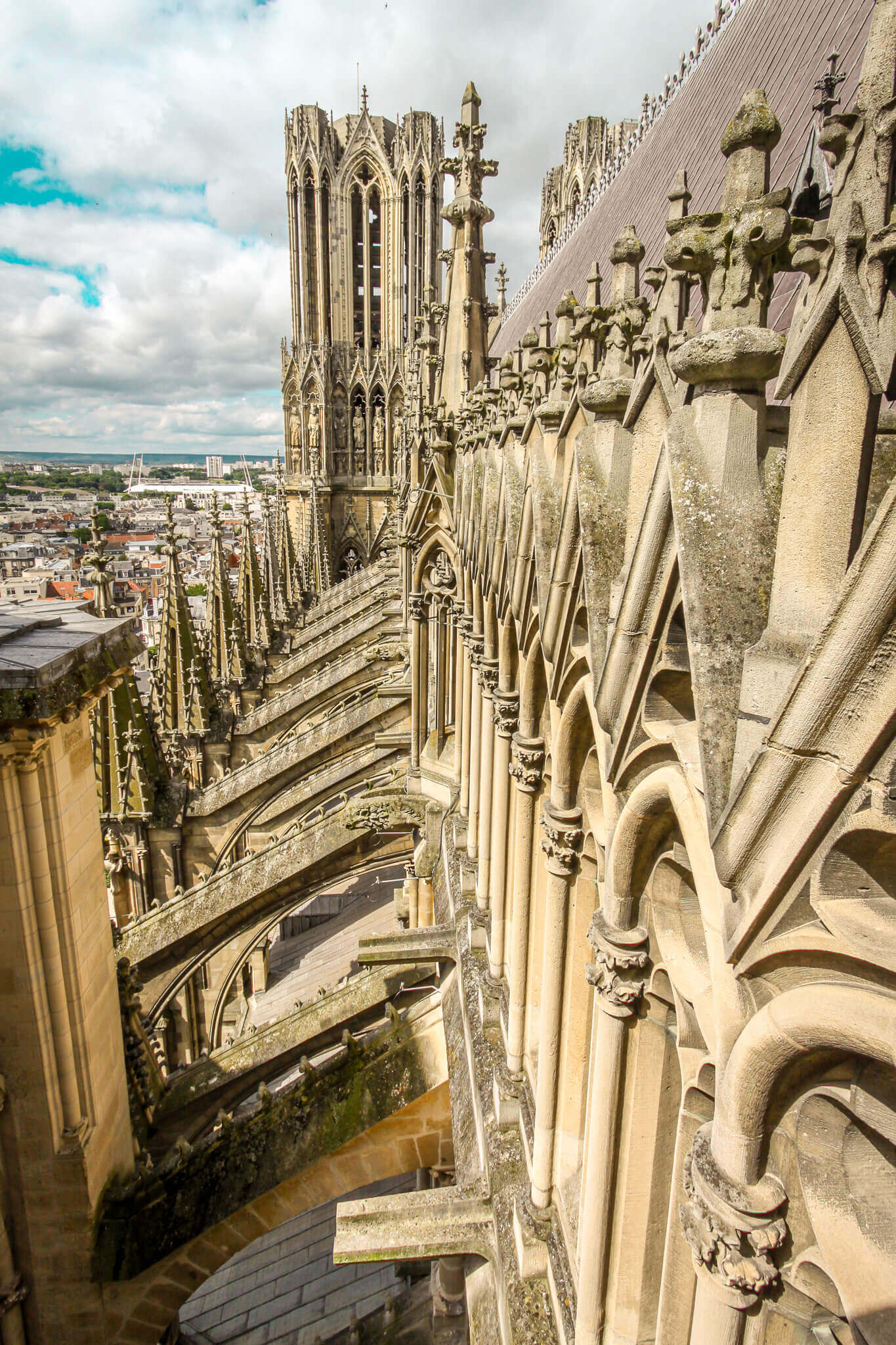 The flying buttresses supporting the nave of the Reims Cathedral