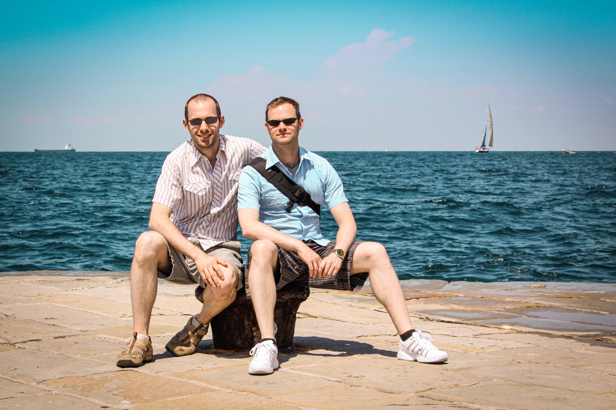 Tourists on the wharf in Trieste, overlooking the northern Adriatic Sea