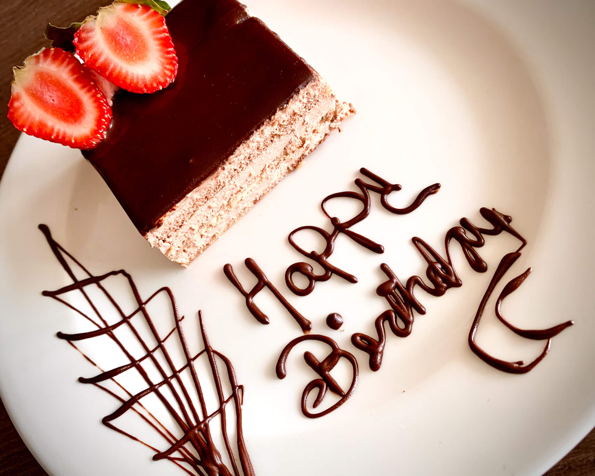 Surprise birthday cake delivered to suite at Excellence El Carmen