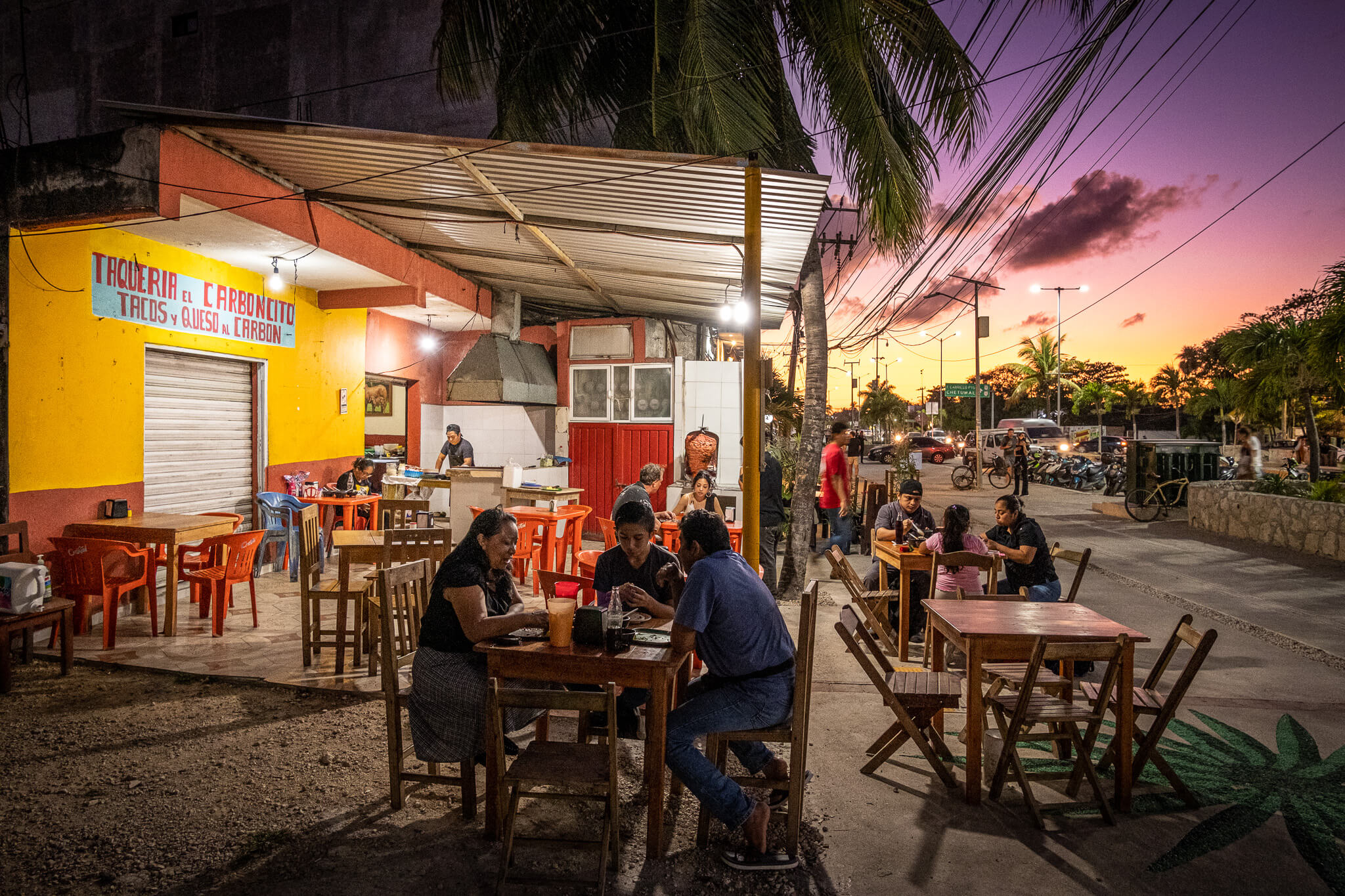 Taqueria el Carboncito taco restaurant in Tulum at sunset