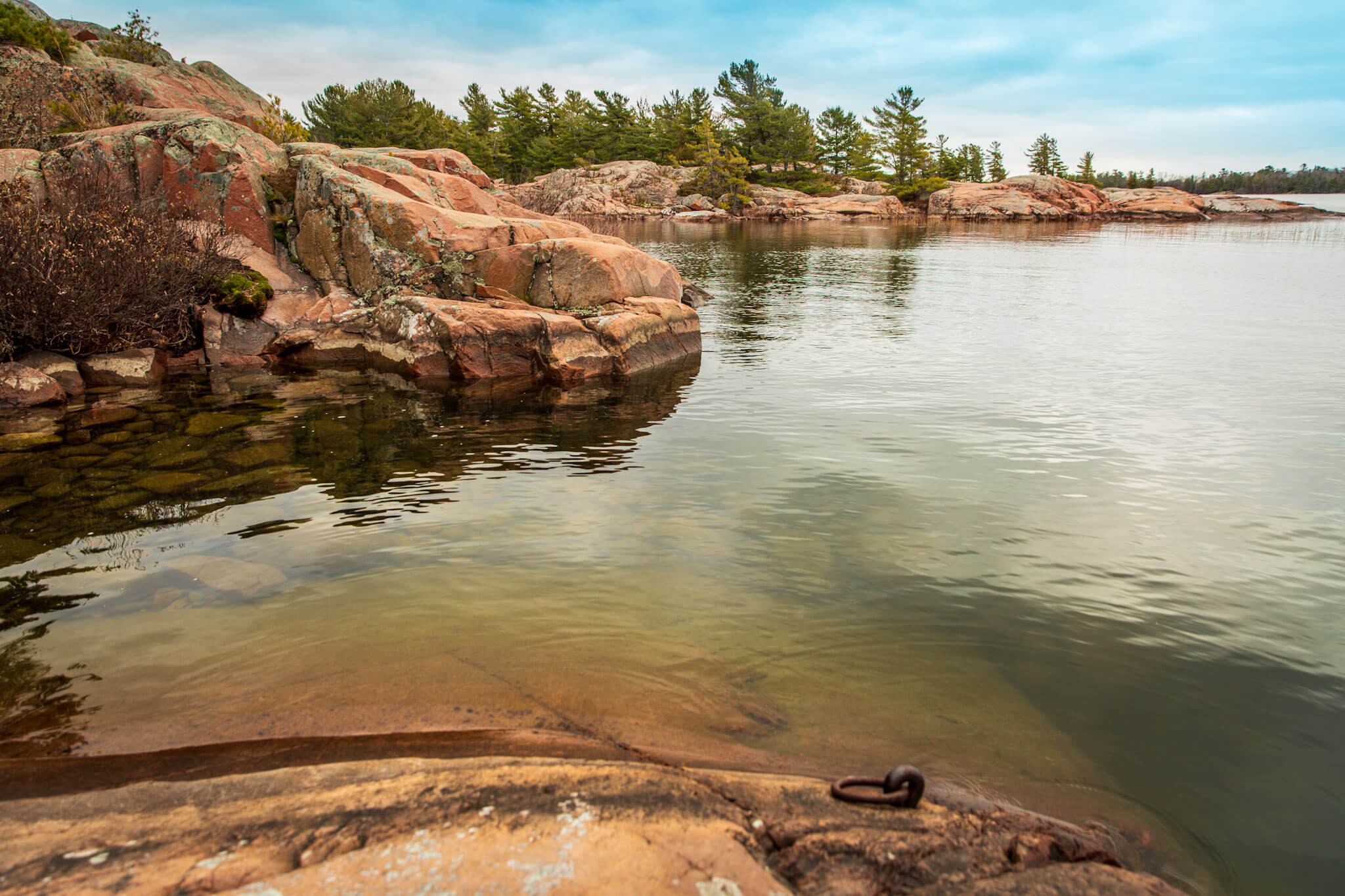 Iron rings along the Chikanishing Trail are a reminder of the logging industry that once dominated this area