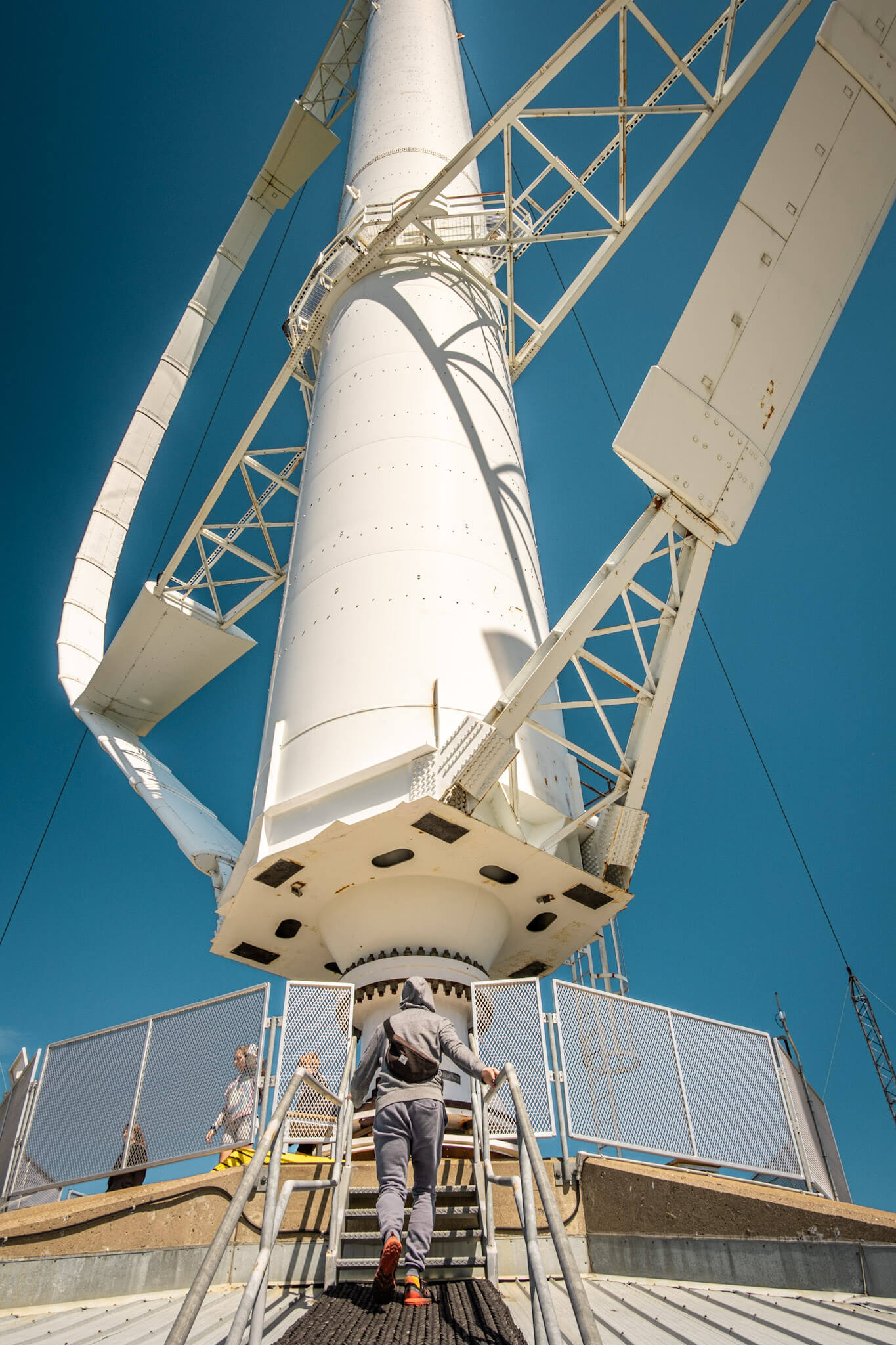Climbing to the base of the vertical axis wind turbine at Projet Éole