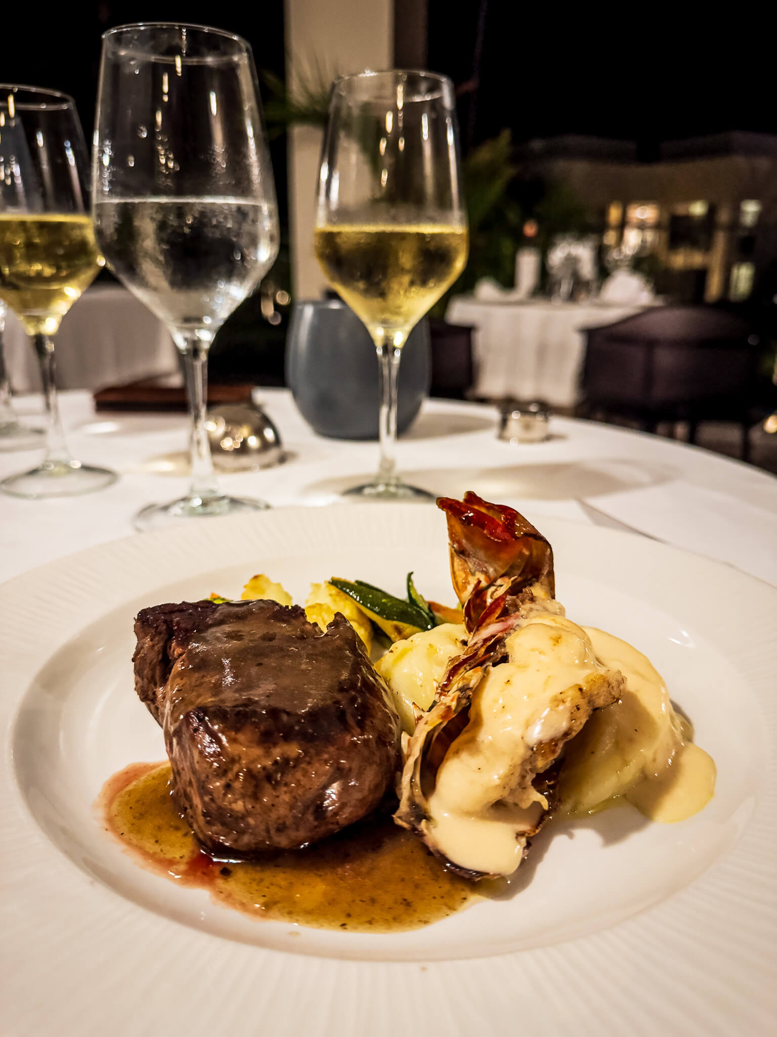 Enjoying the surf and turf for dinner at Excellence El Carmen's Magna restaurant