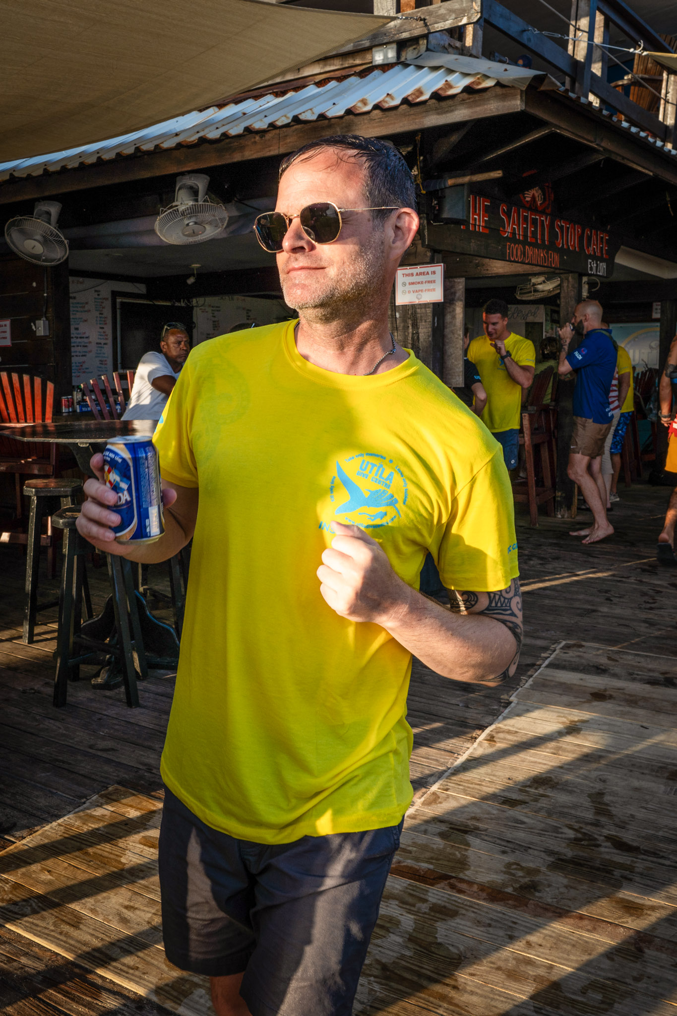 Keith celebrating with a dance after earning his PADI Open Water Scuba Instructor rating