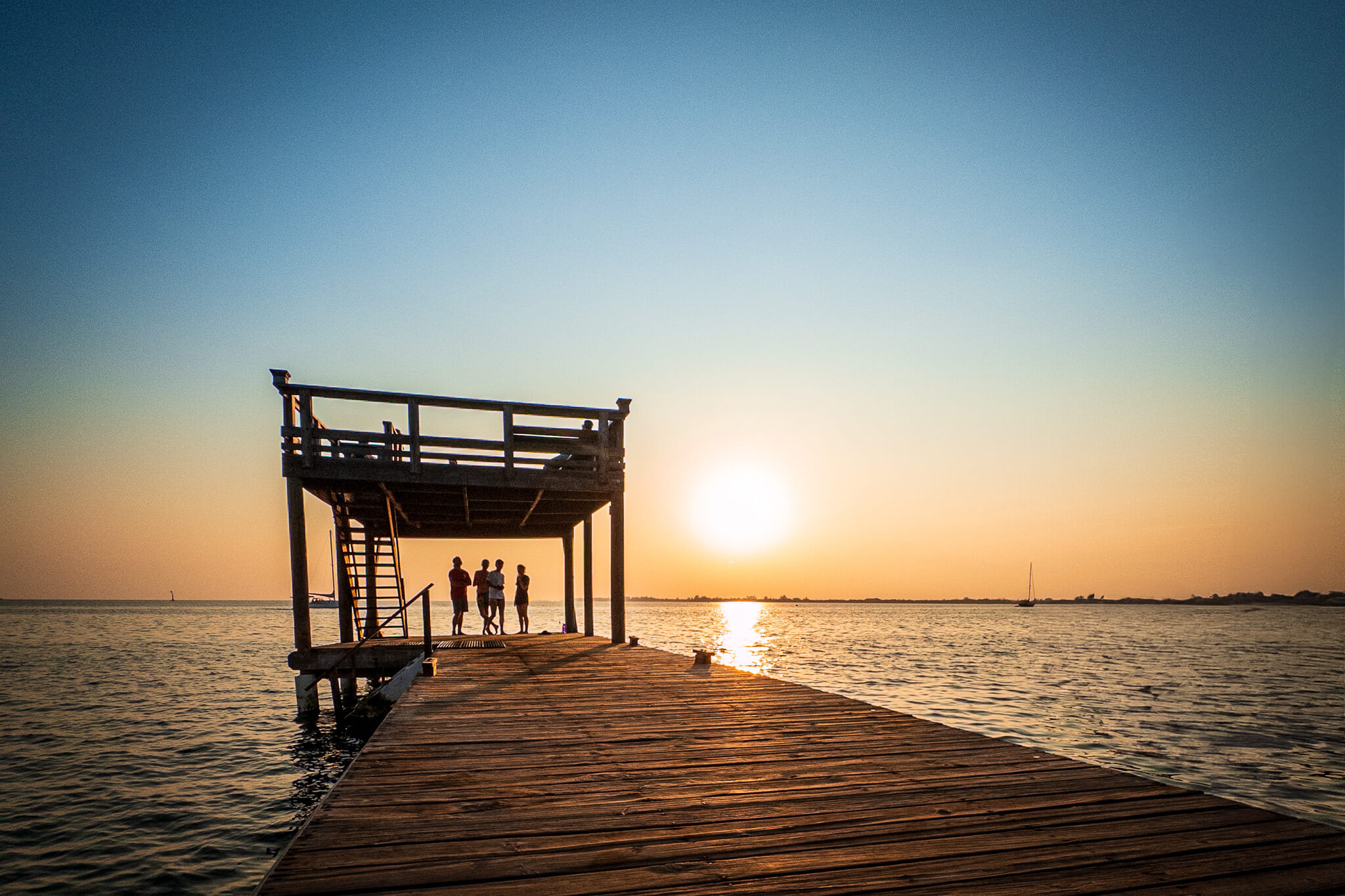 The dock at Utila Dive Center at sunset