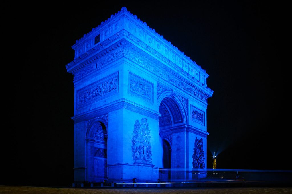 The Arc de Triomphe in Paris, lit up with blue light to celebrate Europe Day in May 2006