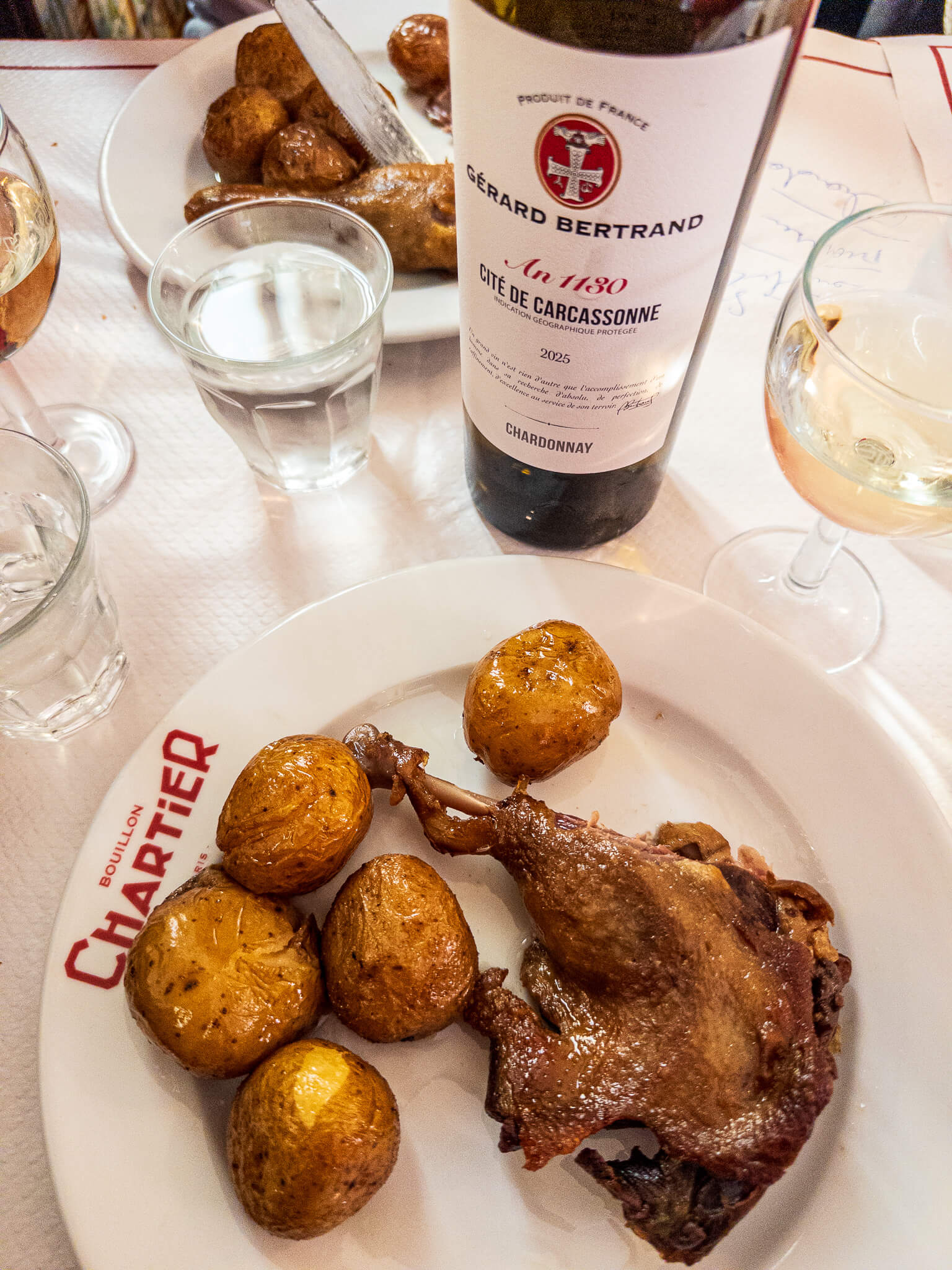 A lunch of duck confit and wine at Bouillon Chartier Montparnasse