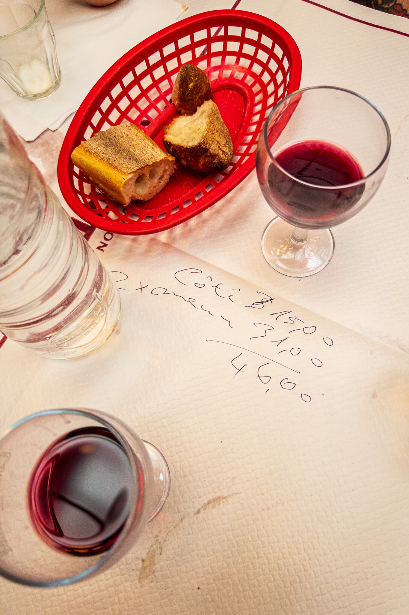 Our lunch bill written on the table cloth at Bouillon Chartier Grands Boulevards