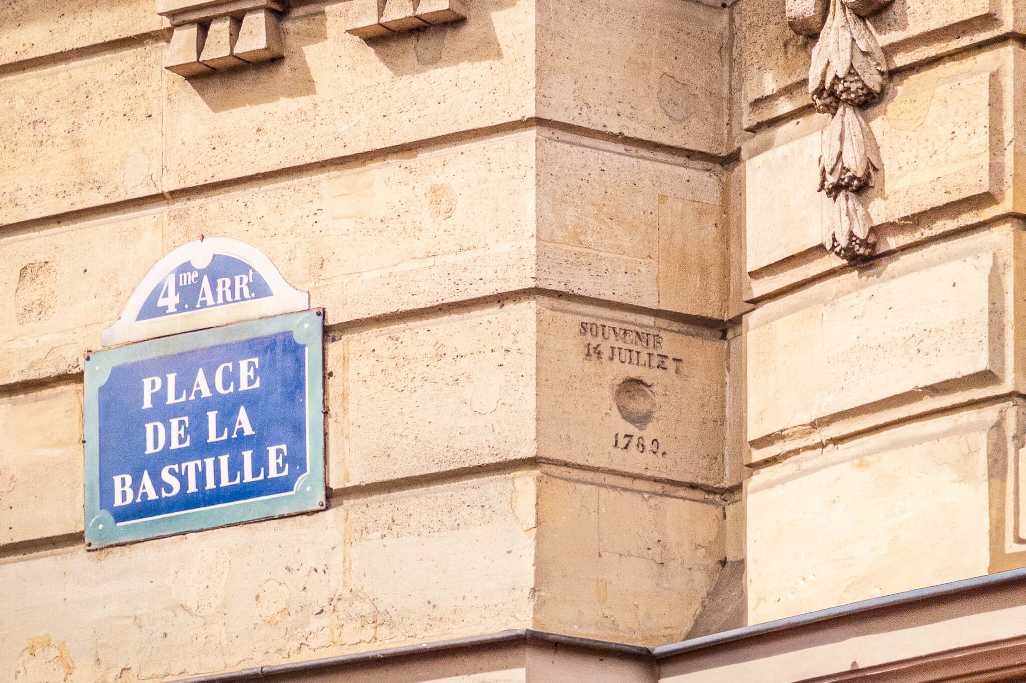 A commemorative cannonball impact from the French Revolution in Place de la Bastille, Paris