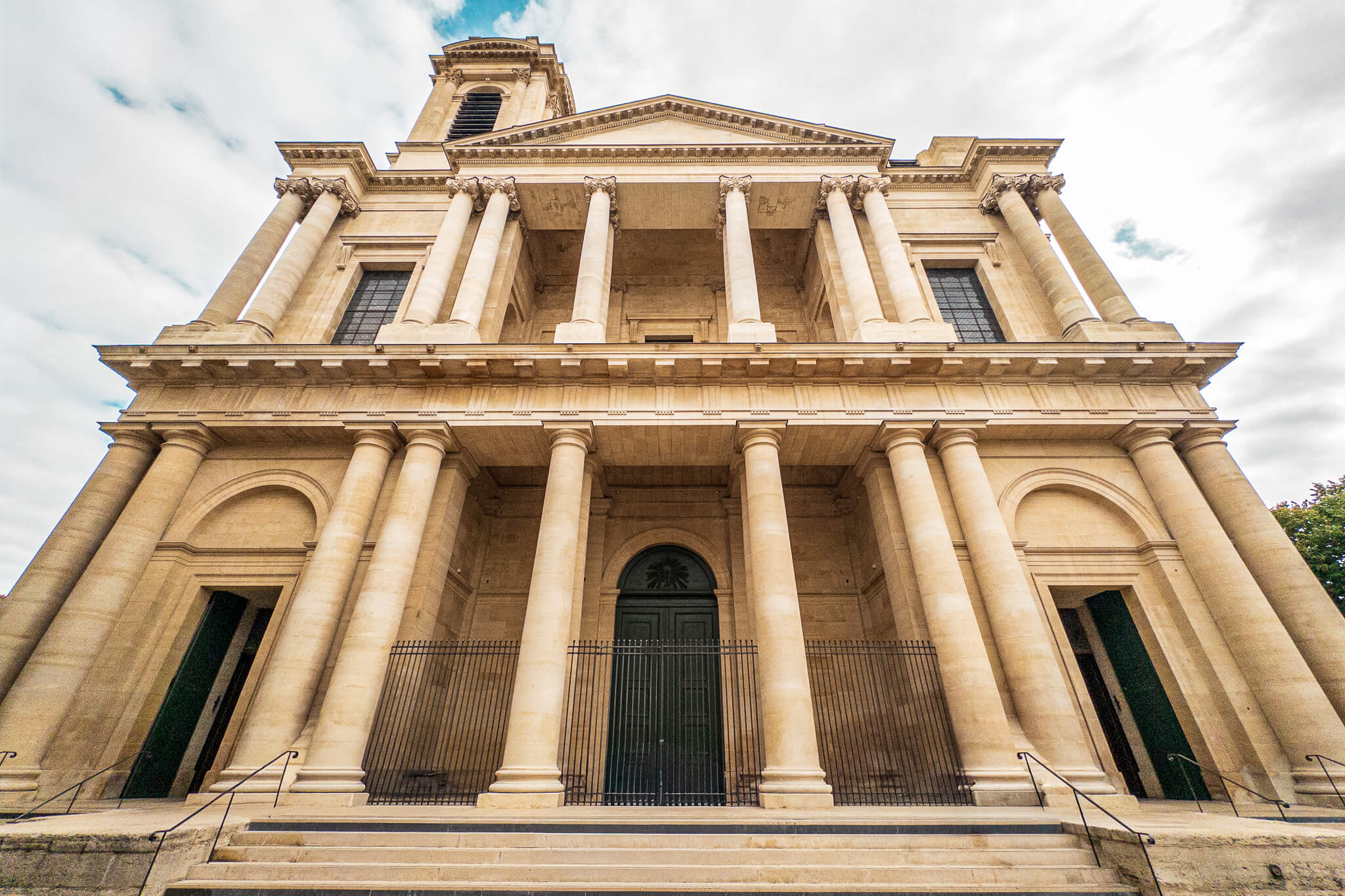 The neoclassical front facade of Église Saint-Eustache in Paris