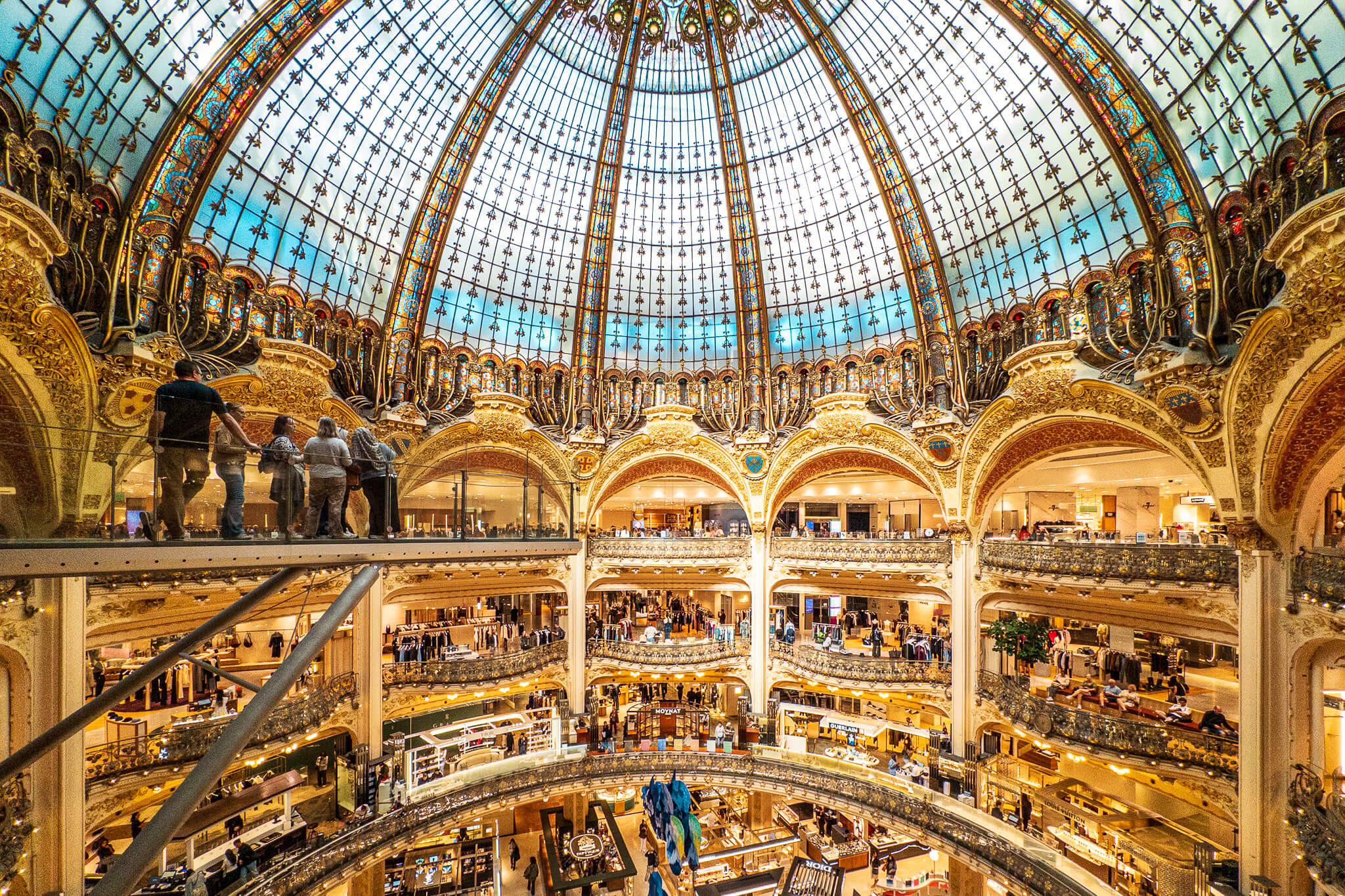 The interior and dome of Galeries Lafayette Haussmann in Paris