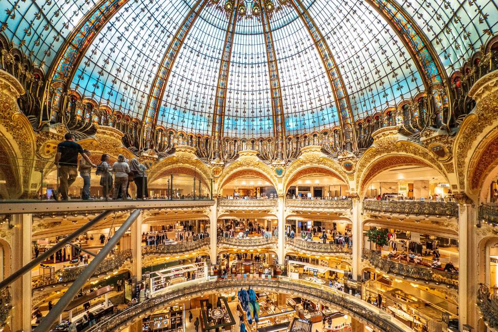The interior and dome of Galeries Lafayette Haussmann in Paris