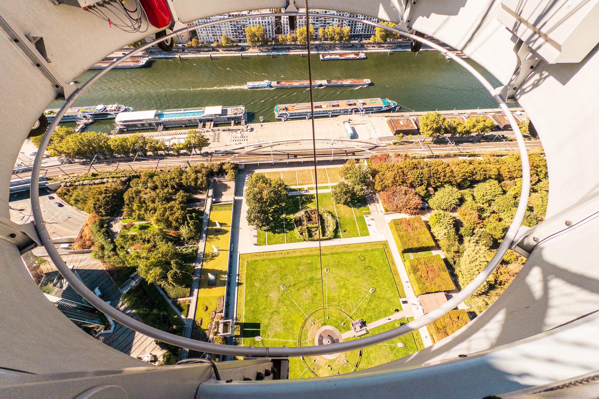 Looking through the platform of the Ballon Generali helium balloon in Parc André-Citroën in Paris