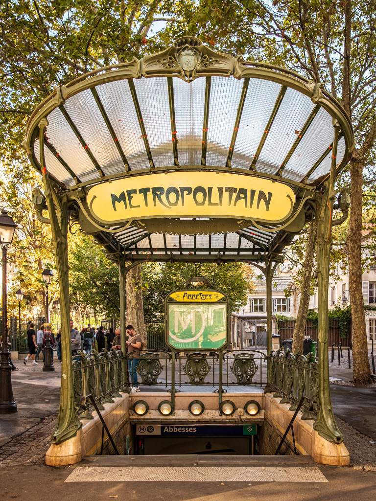 The Art Nouveau covered metro entrance by Hector Guimard at Abbesses station in Montmartre, Paris