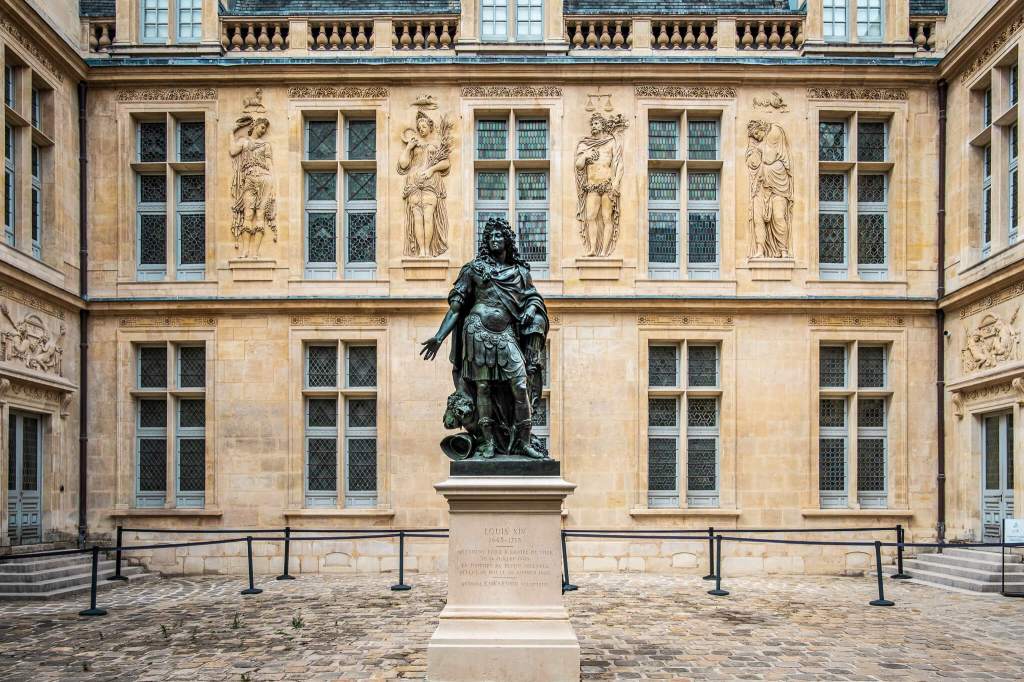 The statue of Louis XIV in the courtyard of Musée Carnavalet