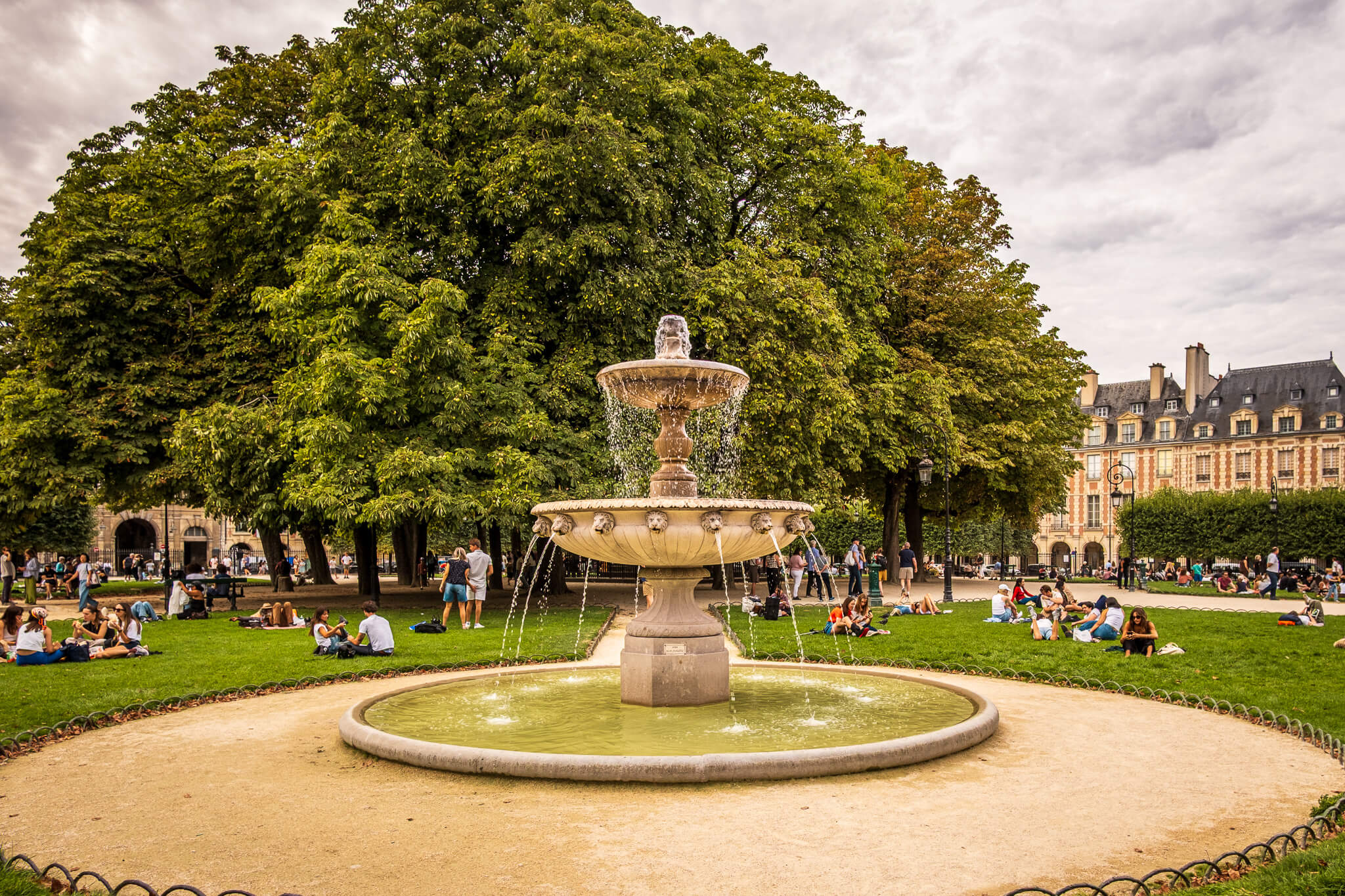 A fountain in Place des Vosges in Paris