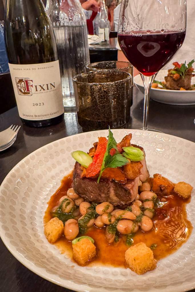 A five-course tasting menu with red wine at Le Radis Beurre in Paris