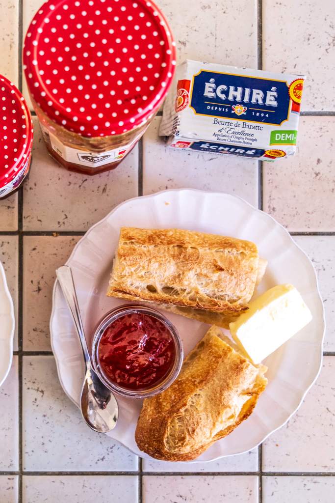 A typical Parisian breakfast of baguette tradition, AOP butter and strawberry jam